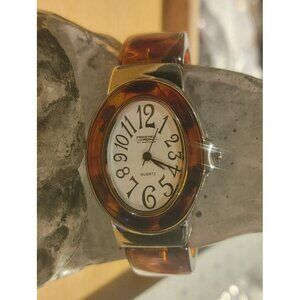 Vintage Tortoiseshell Bangle Watch Whimsical Swirl Dial Stainless Steel Back